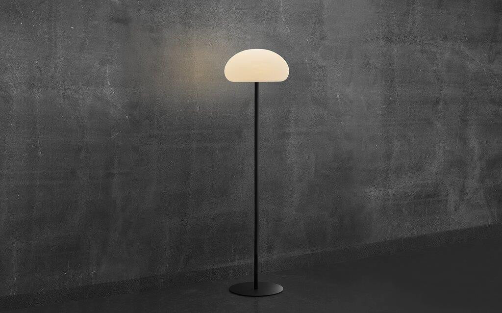 Sponge 34 Floor lamp next to dark wall.